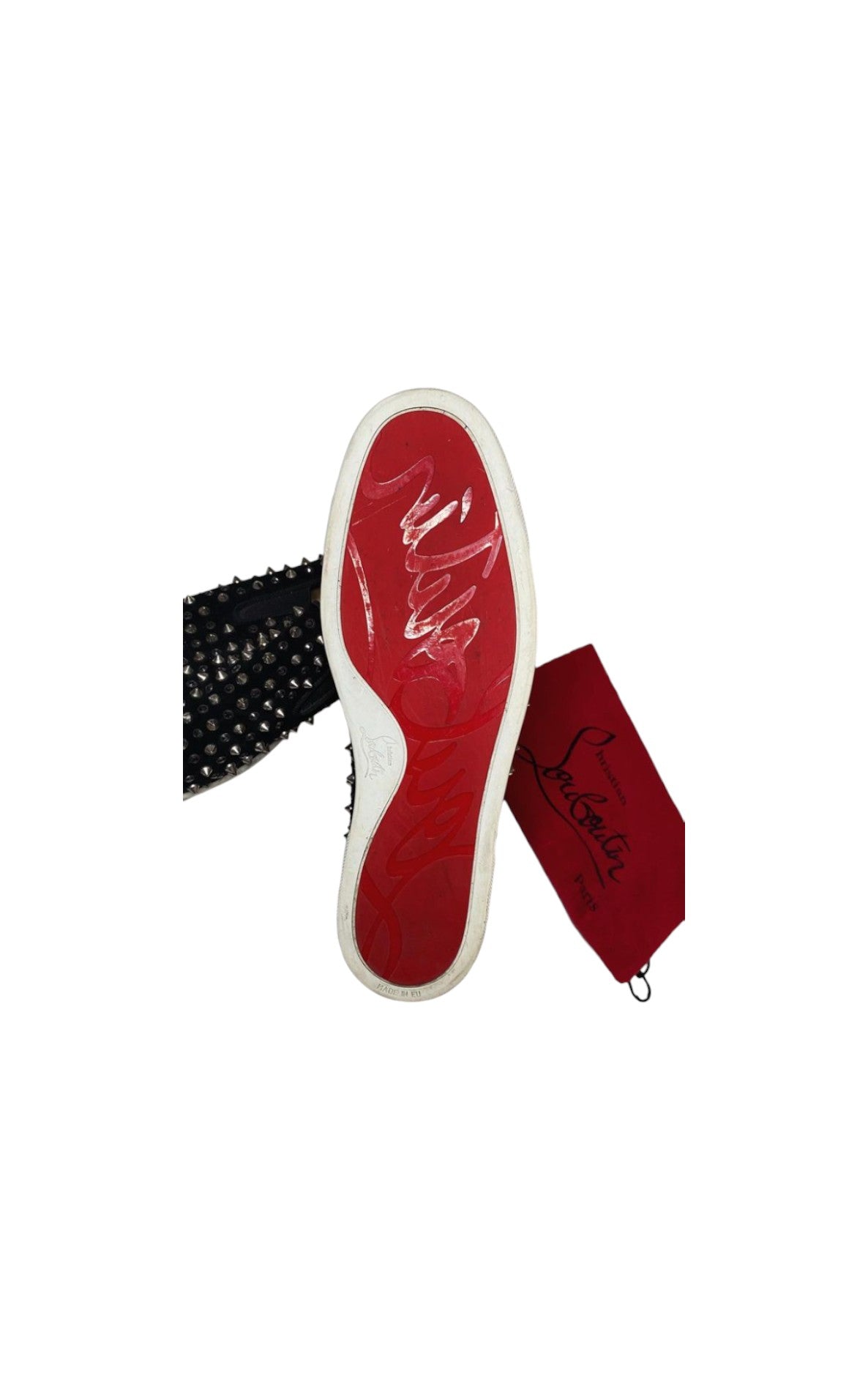 Christian Louboutin “Spike Roller Boat Flats”