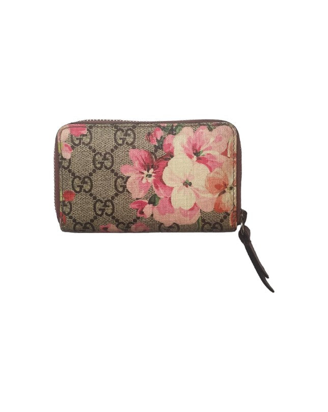 Gucci ‘Supreme Monogram Bloom Zipper Purse’